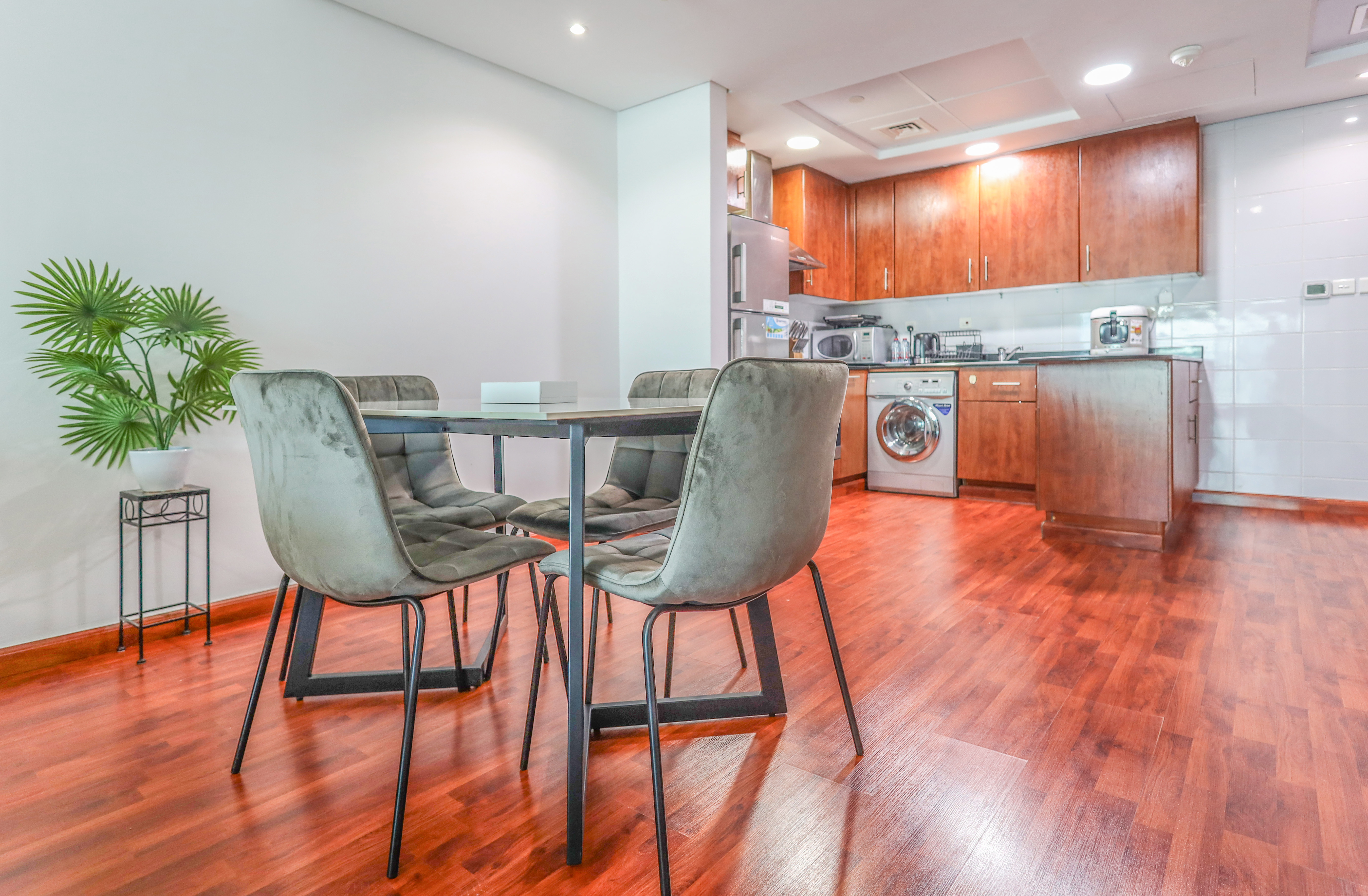 Dine for four in the bright open-plan space beside the kitchen