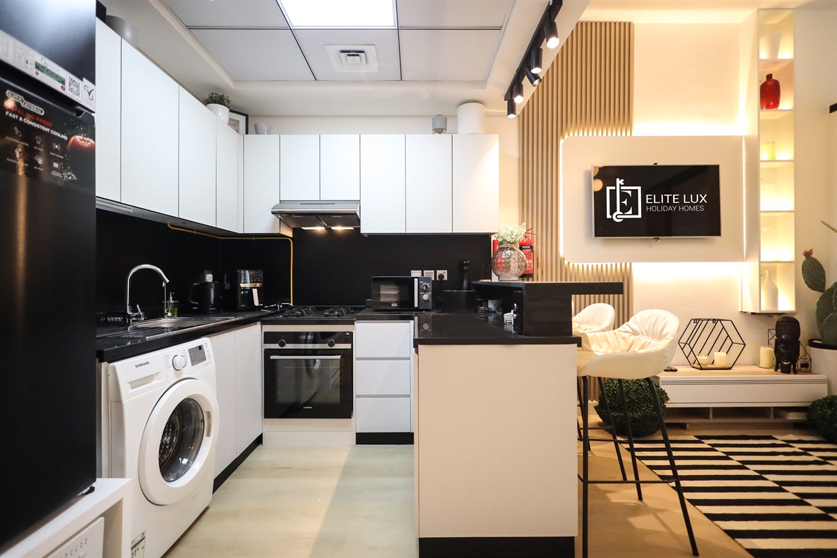 Full kitchen, washer included — nothing's missing here